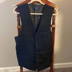Navy blue tweed pattern vest.